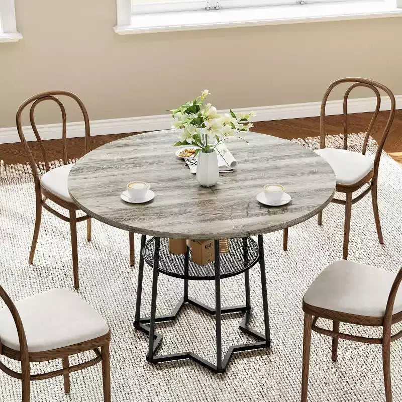 Table à manger piètement boucle en fer noir, 4 places, plateau marron/gris